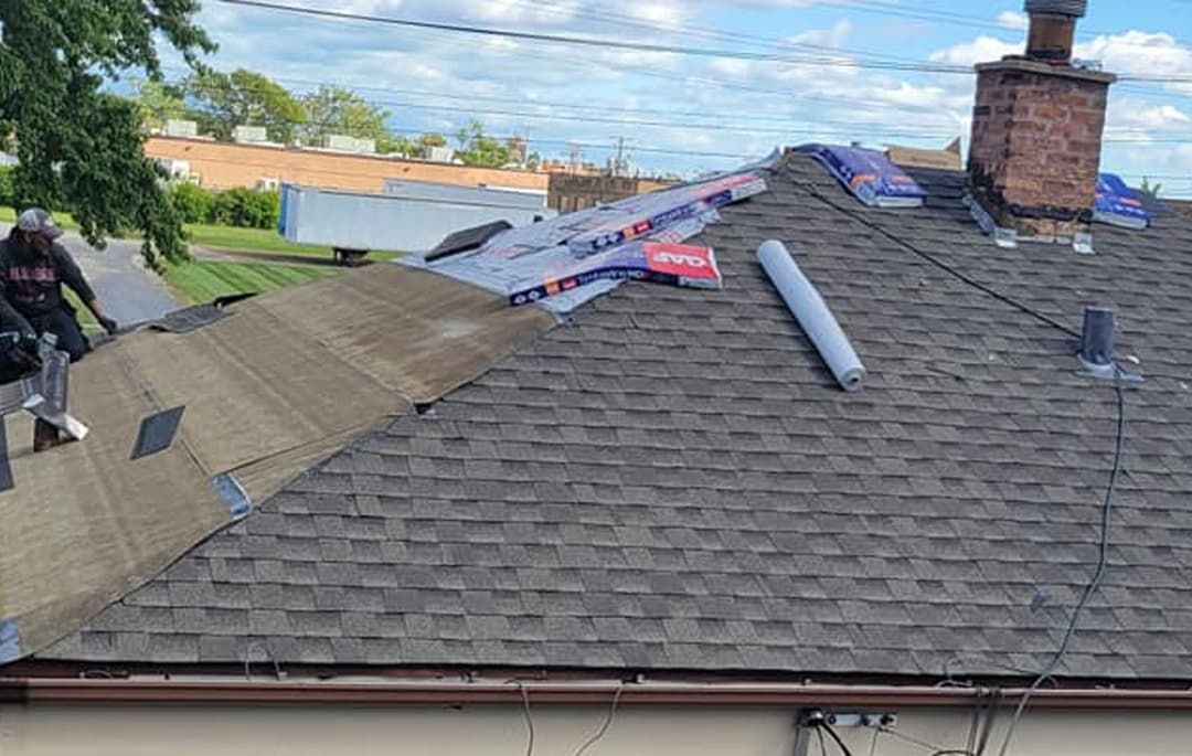 Wide-angle view of residential roof after repairs